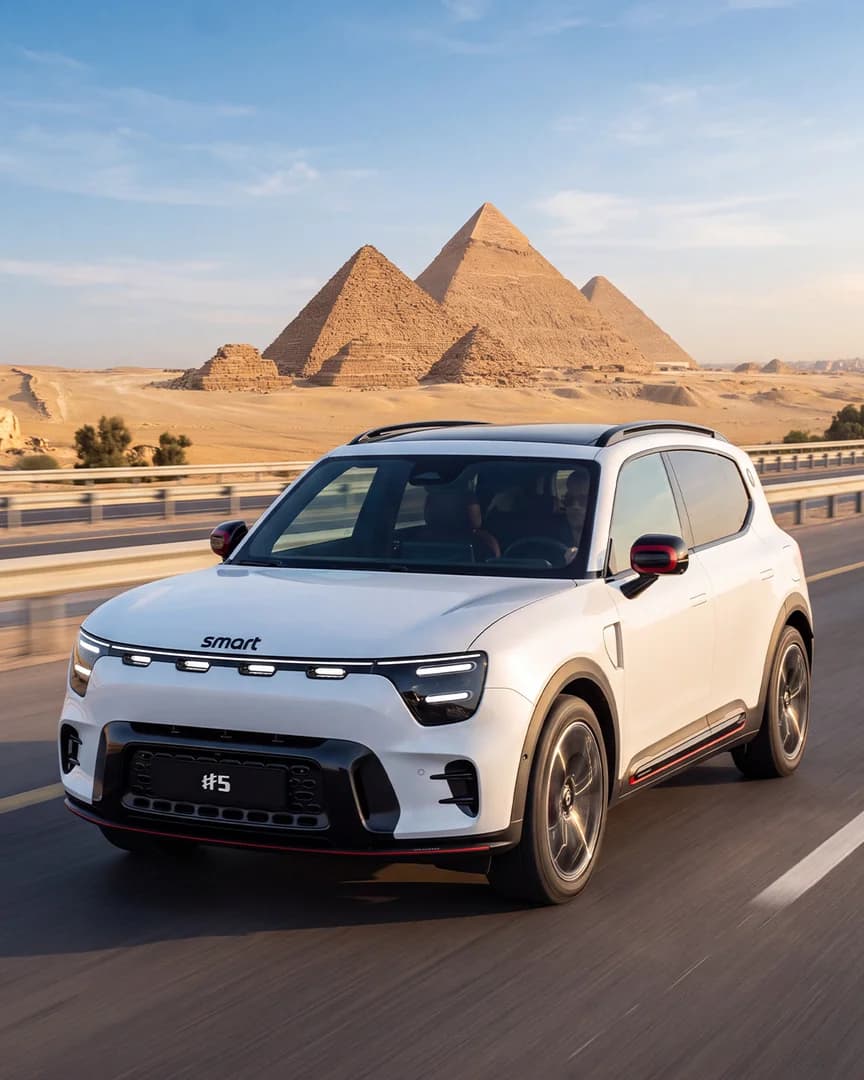 Illustrative smart #5 electric SUV campaign scene near the pyramids of Giza